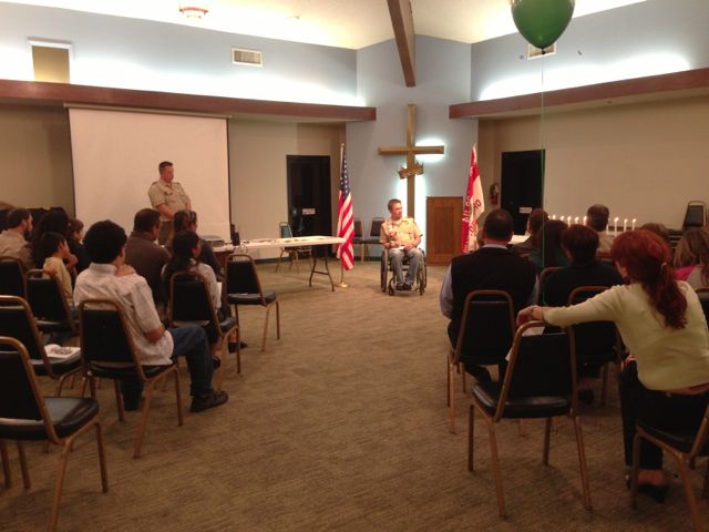 photo of wounded warrior giving keynote speech