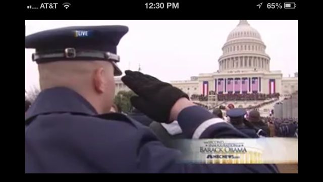 Soldier saluting the White House flags