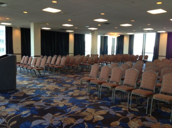 empty chairs in hotel meeting room