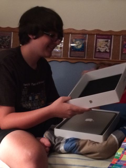 Teen receiving MacBook Air for birthday