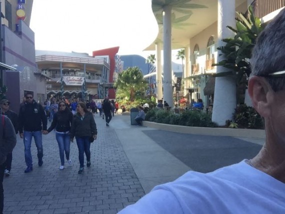 Disney Speaker jeff noel running through Downtown Disney