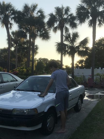 Florida homeowner washing car