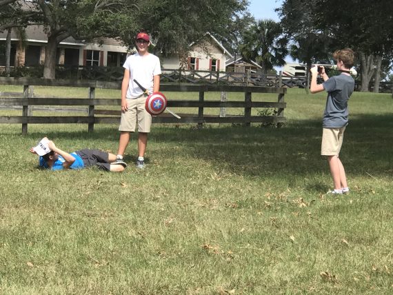 High School students filming a project