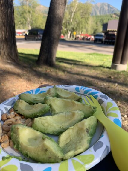 paper plate with cut avocado 