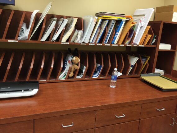 teddy bear in office mail slot