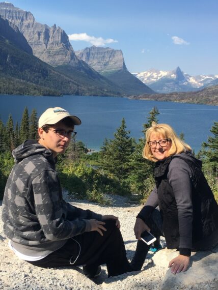 mom and son in mountains