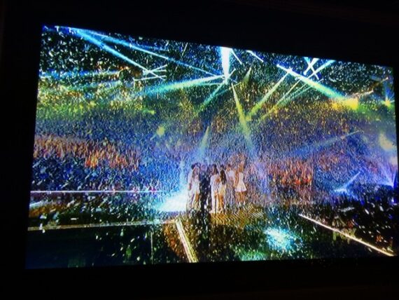 stage filled with falling confetti