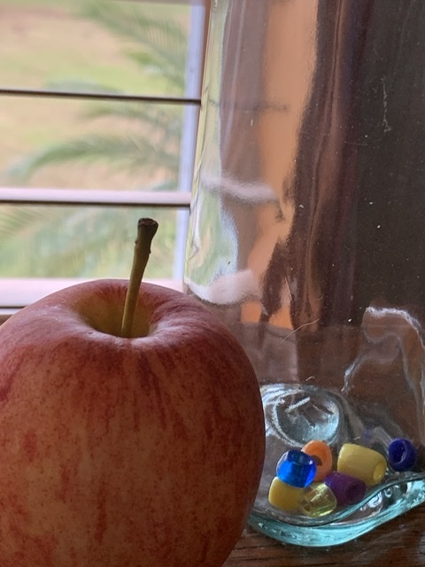 apple sitting on a desk