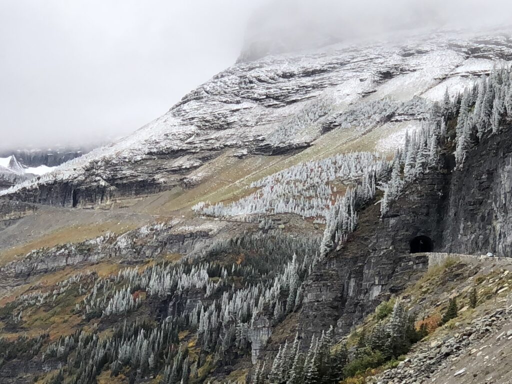 mountain covered in a light snow