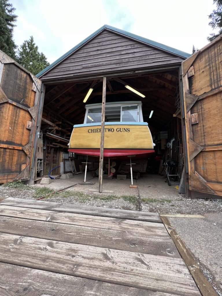 Historic boat in boathouse