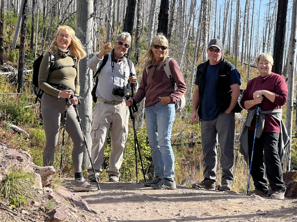 Five hikers on a trail