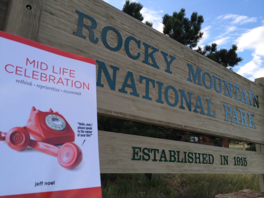 National Park sign and a book