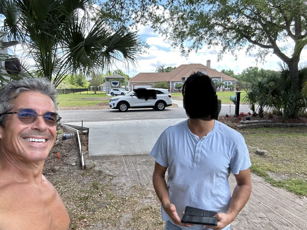 Two people at a homeowner entrance