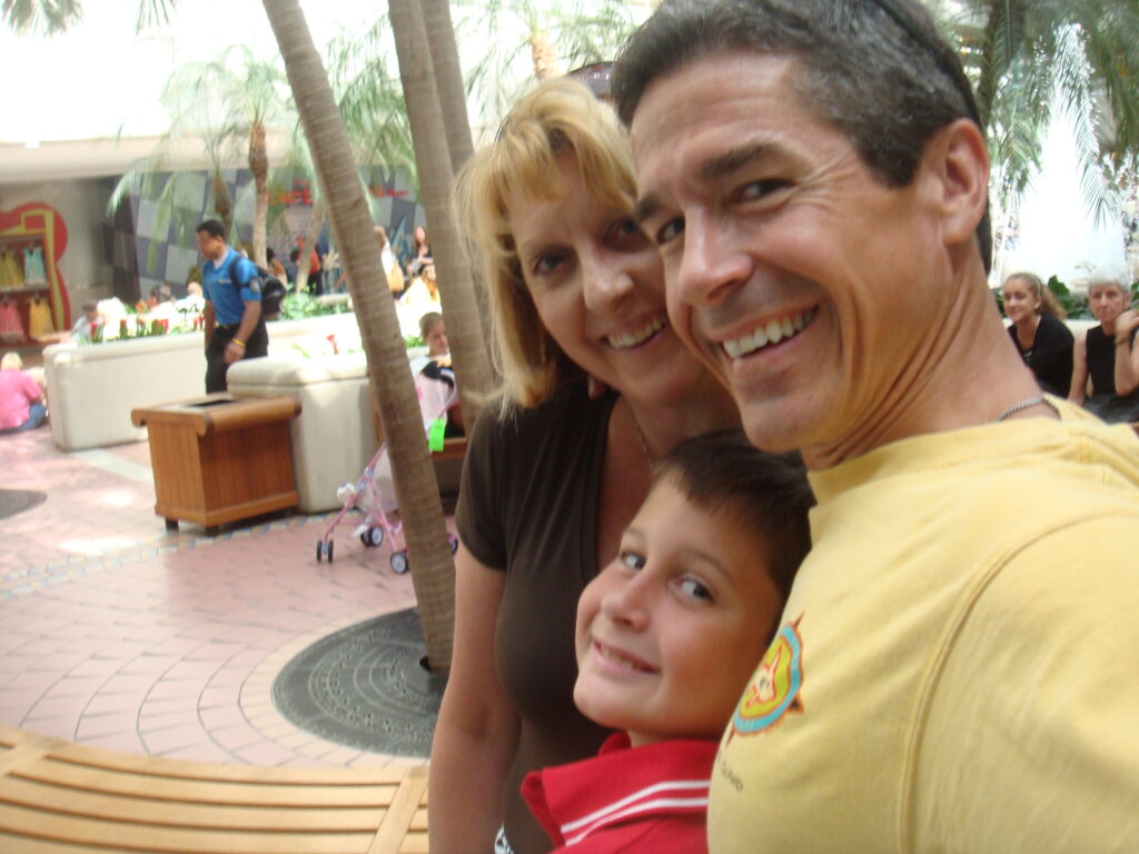 family of three at airport