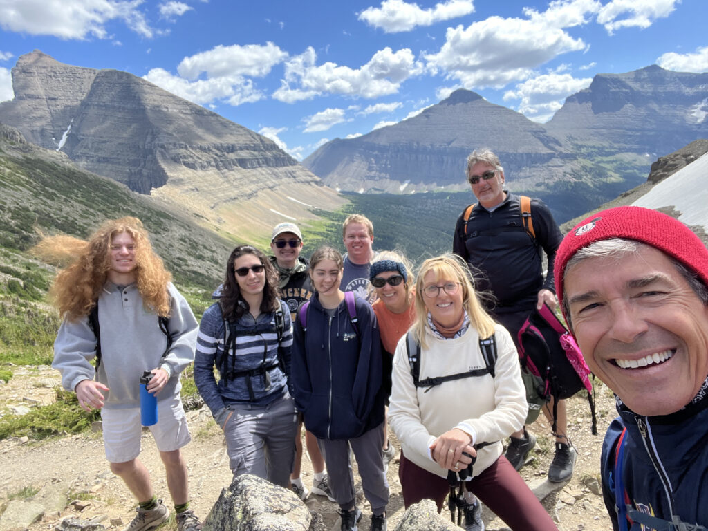 Nine hikers in mountains