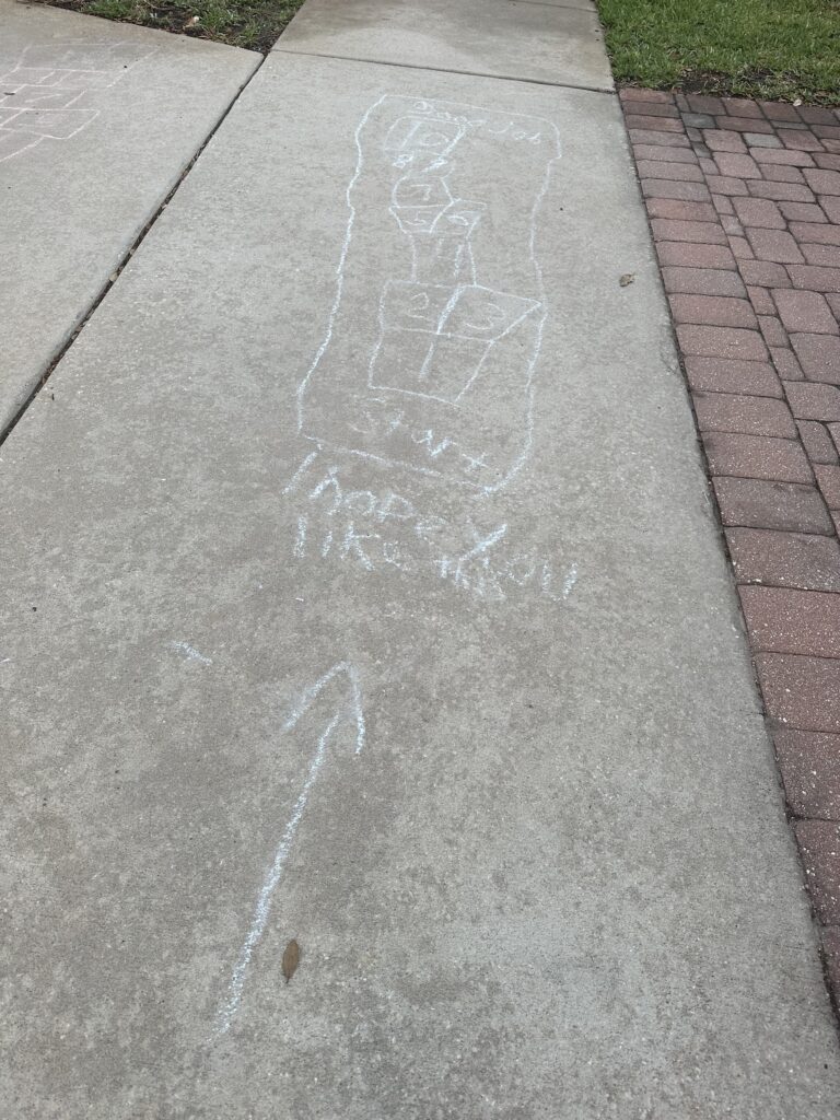 Chalk art on sidewalk