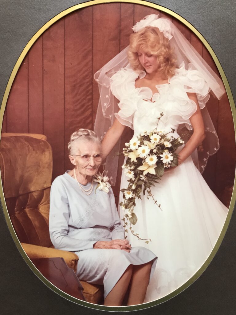 bride and her grammy posing before leaving home for the church