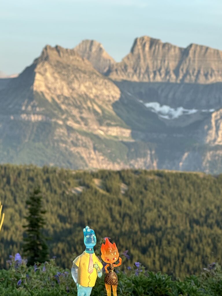 Disney figurines in the mountains 