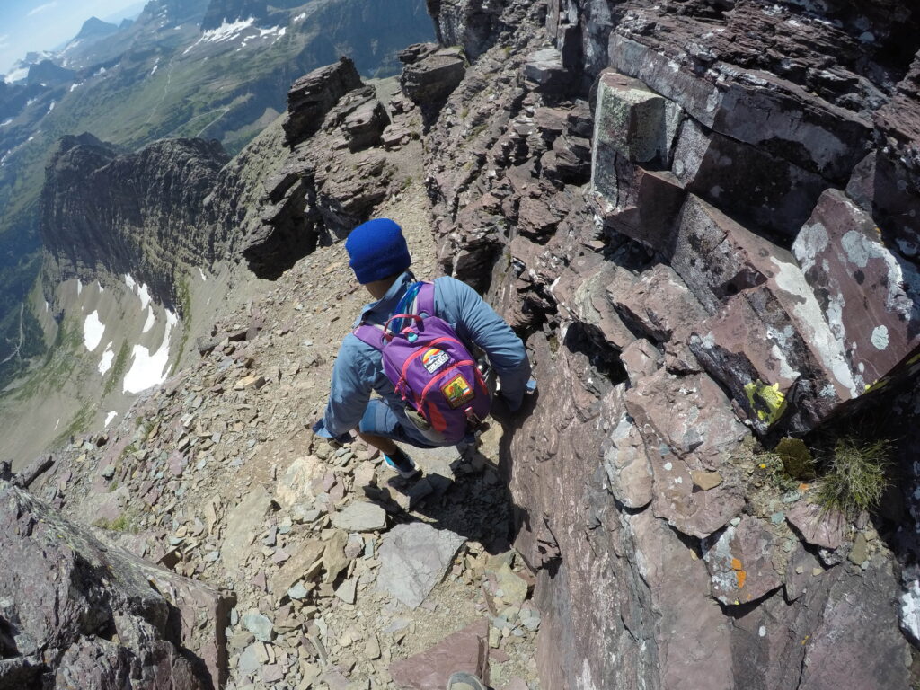 man climbing a mountain