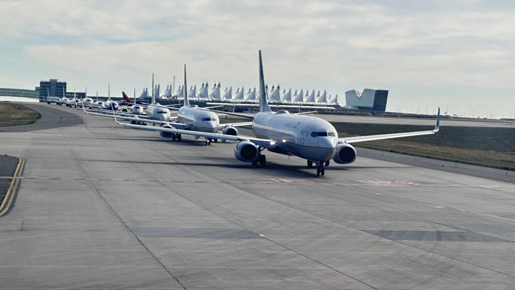 Long line of planes at Denver