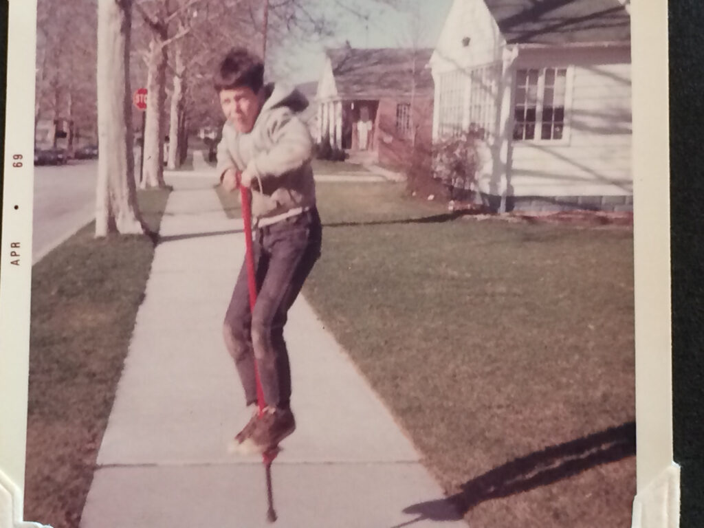 boy on a pogo stick