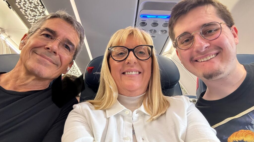 Three adults on a plane