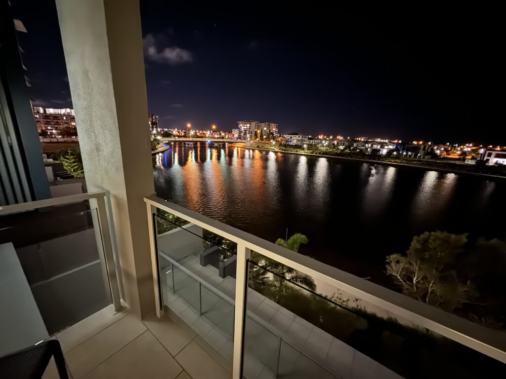 Waterfront Apartment view at night from balcony