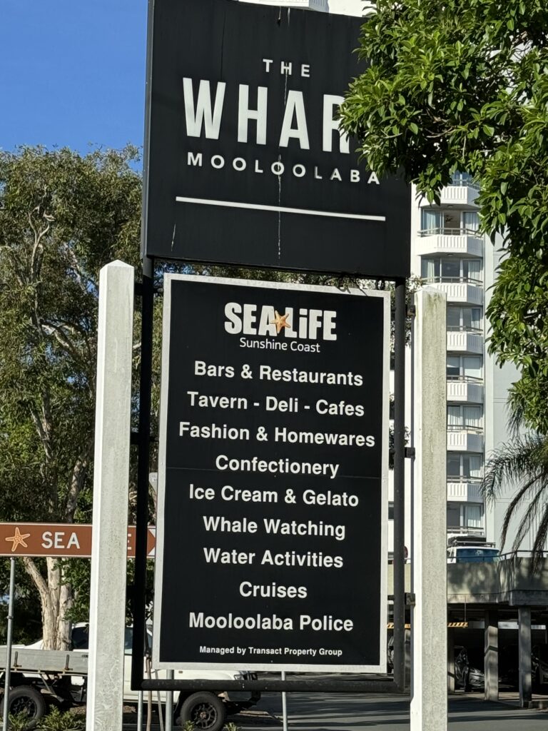 Shopping and dining district sign