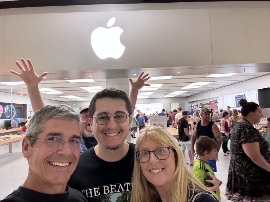 Adults at an Apple store