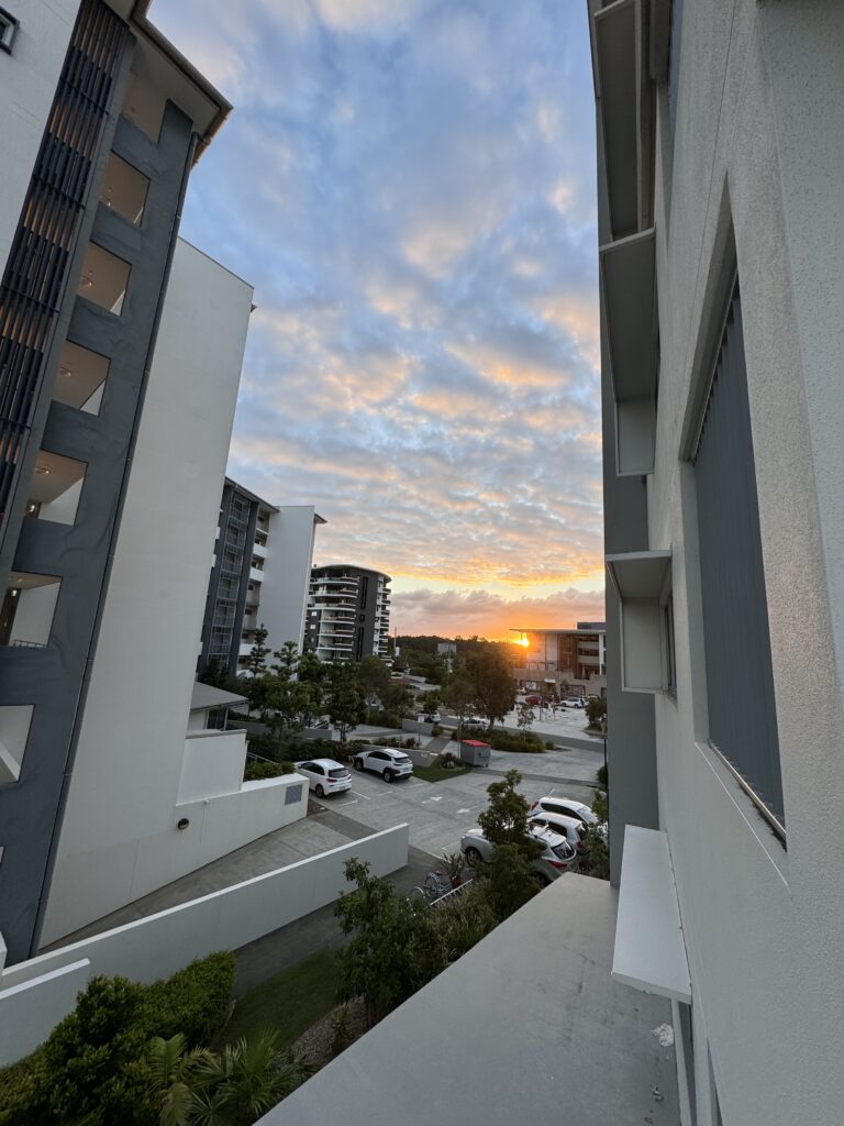 Sunset between buildings