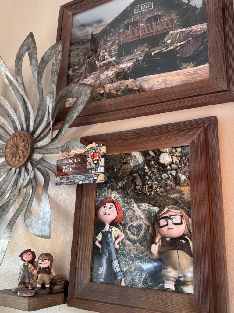 Disney Pixar toys and mountain photo display