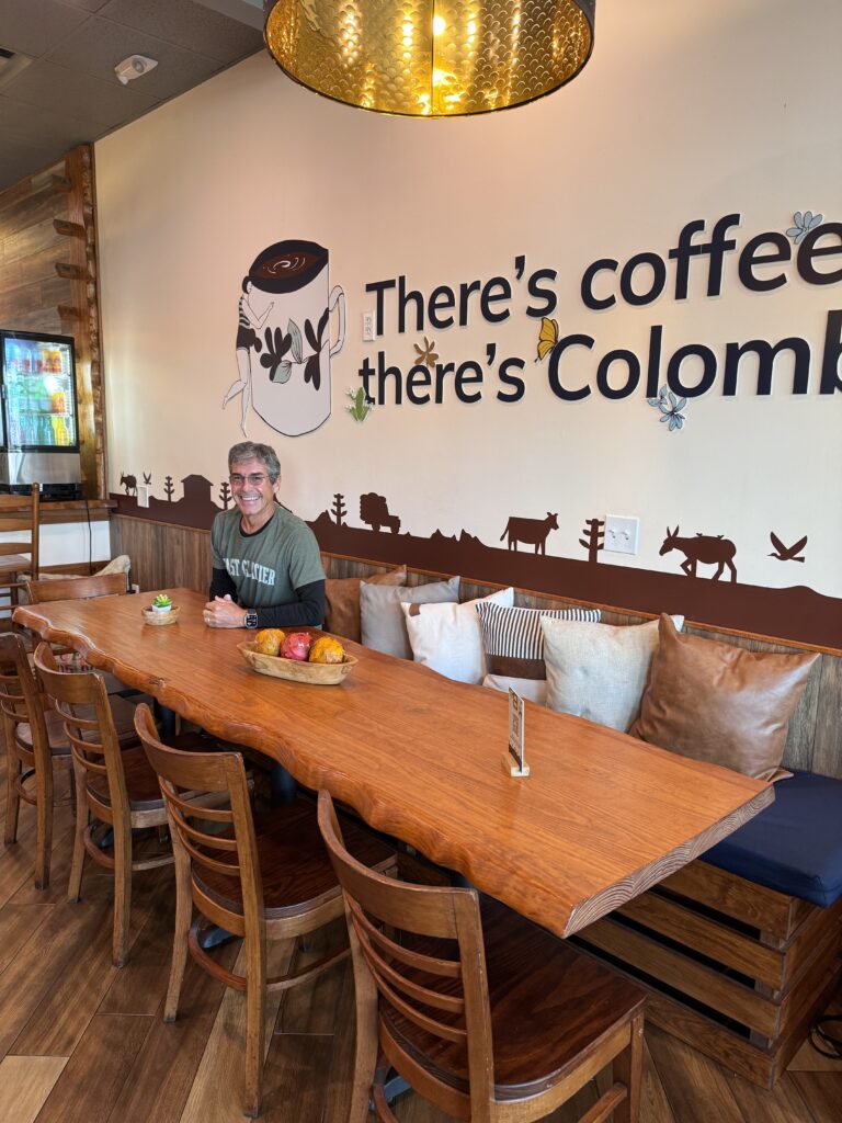 Man at coffee shop table