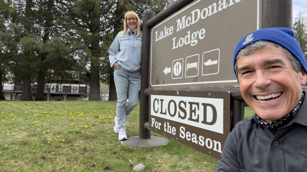 Couple at National Park Lodge sign