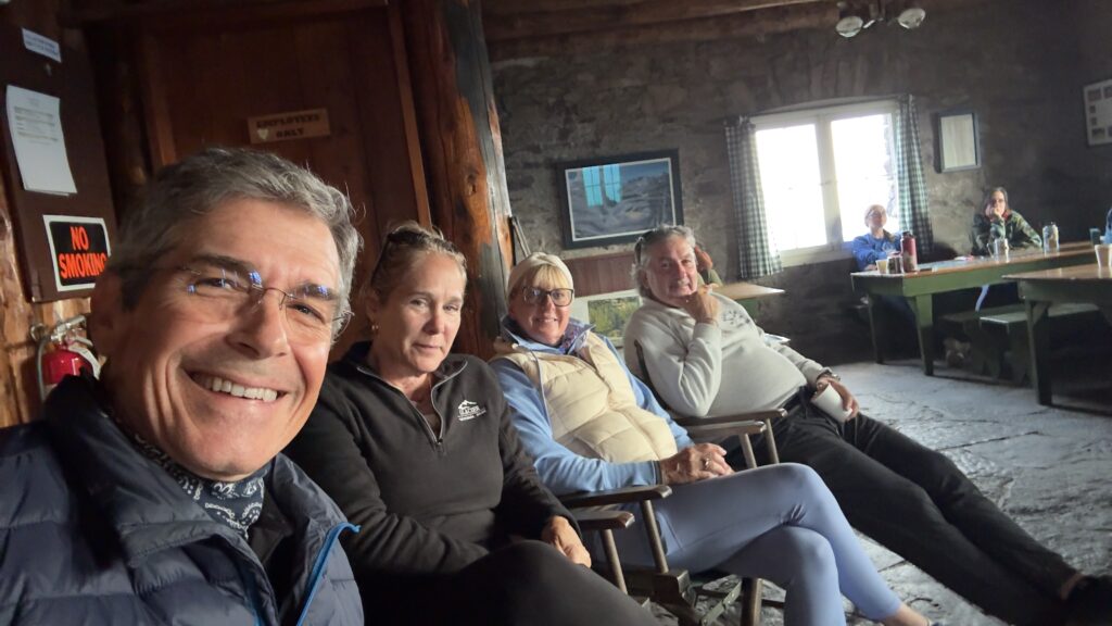 people at high mountain chalet