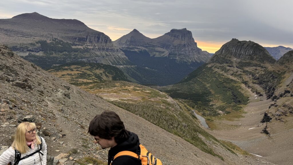 two people on a mountain trail