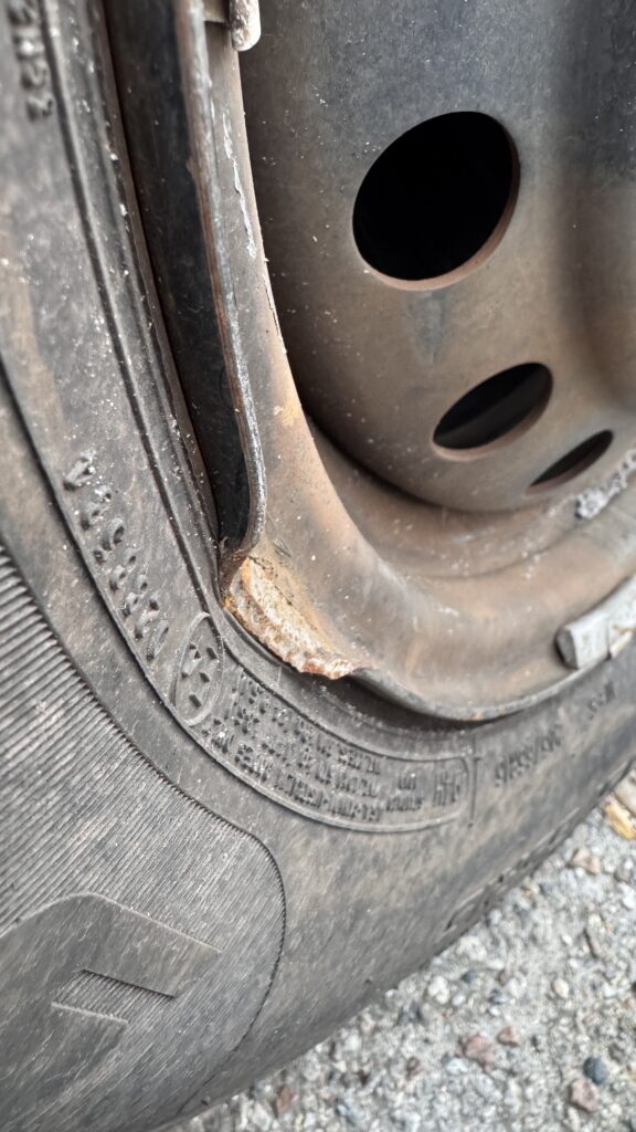 Bent car tire rim