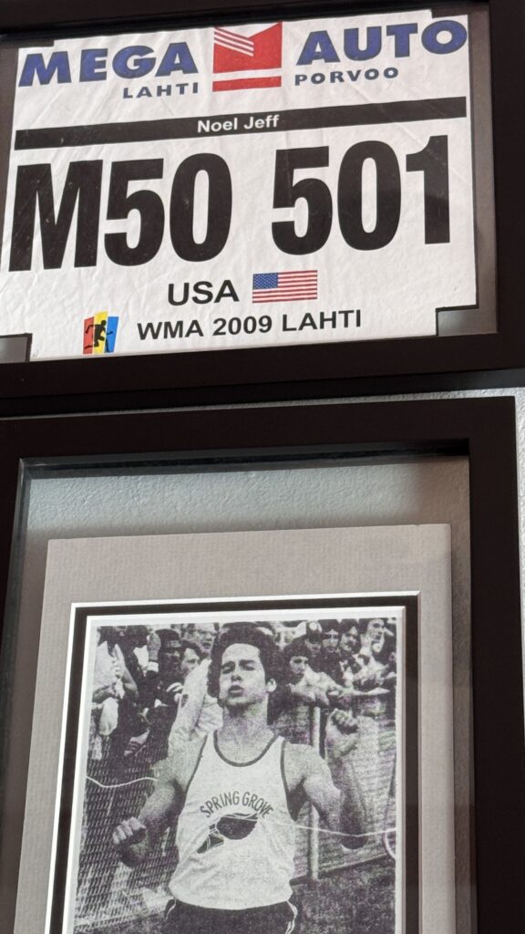 two black frames with personal items