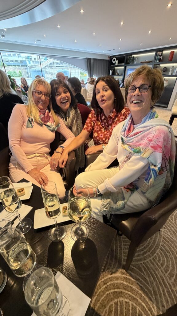 Four senior women at a party