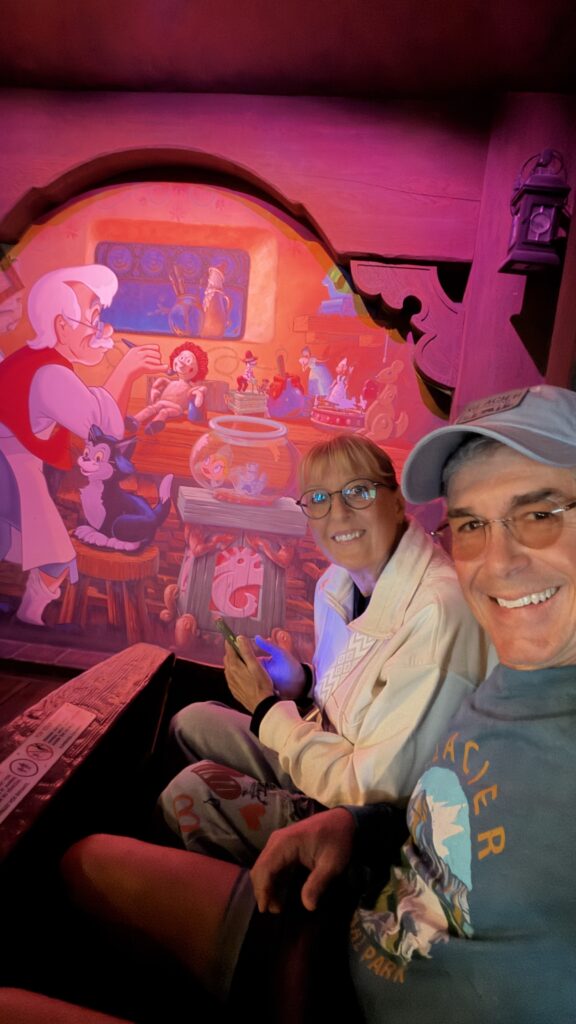 two seniors on disney ride
