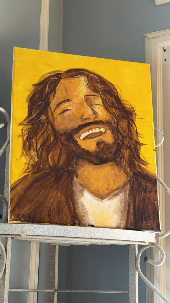smiling Jesus painting in a gift shop