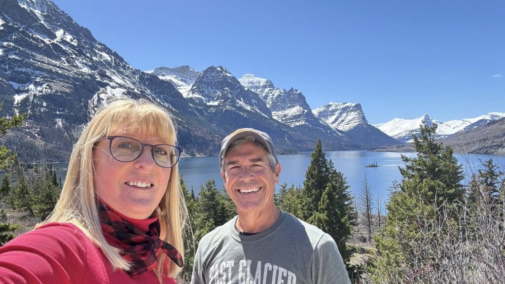 senior couple in Glacier National Park wild goose island